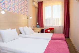 Гостиница Atlas Hotel Иркутск Стандартный двухместный номер с 2 раздельными кроватями -1